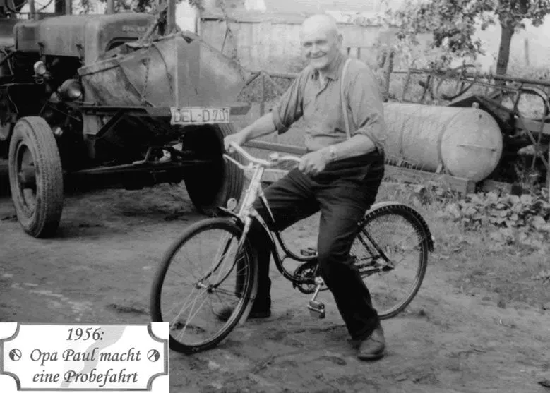 Historische Aufnahme mit Fahrrad vor dem Betriebsgelände